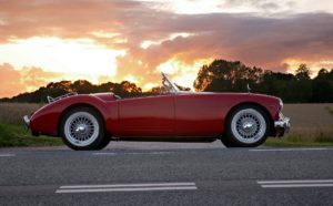 A classic car at sunset.