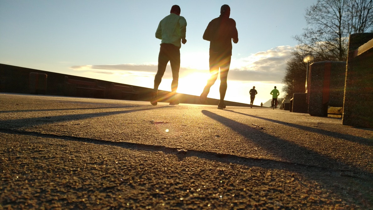 People running on a road.